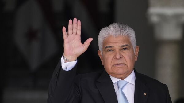 Panamanian President Jose Raul Mulino waves to the press before his meeting with Costa Rica's President Rodrigo Chaves Robles at the presidential palace in Panama City, Friday, Aug. 23, 2024. (AP Photo/Matias Delacroix) - Sputnik India