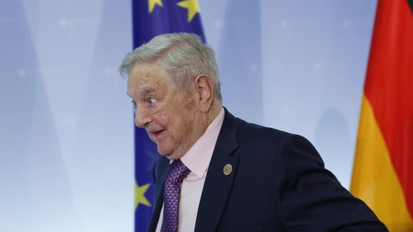 Hungarian-American investor George Soros leaves after a press conference prior to the launch event for the European Roma Institute for Arts and Culture at the Foreign Ministry in Berlin, Germany, Thursday, June 8, 2017. - Sputnik भारत