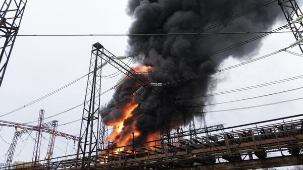 Flames and smoke rise from a blaze at an electricity facility after a Russian attack in Kharkov, Ukraine, March 22, 2024.  - Sputnik India