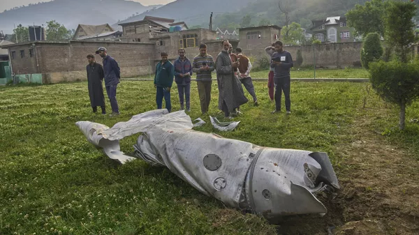 Debris of an aircraft lie in the compound of a mosque at Pampore in Pulwama district of Indian controlled Kashmir, Wednesday, May 7, 2025. (AP Photo/Dar Yasin) - Sputnik India
