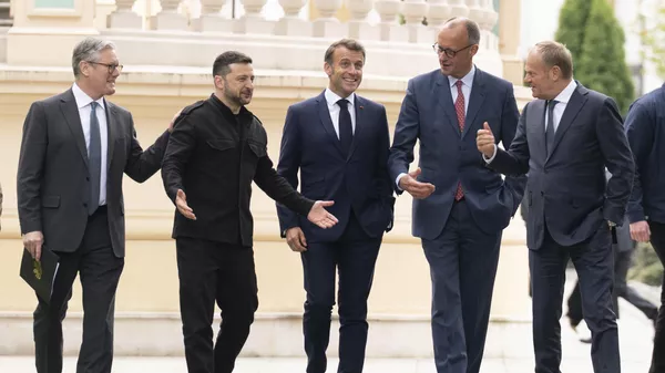 From left, British Prime Minister Keir Starmer, Ukrainian President Volodymyr Zelenskyy, French President Emmanuel Macron, German Chancellor Friedrich Merz and Poland's Prime Minister Donald Tusk walk at the Presidential Palace in Kyiv, Ukraine, Saturday May 10, 2025. (Stefan Rousseau/Pool Photo via AP) - Sputnik India