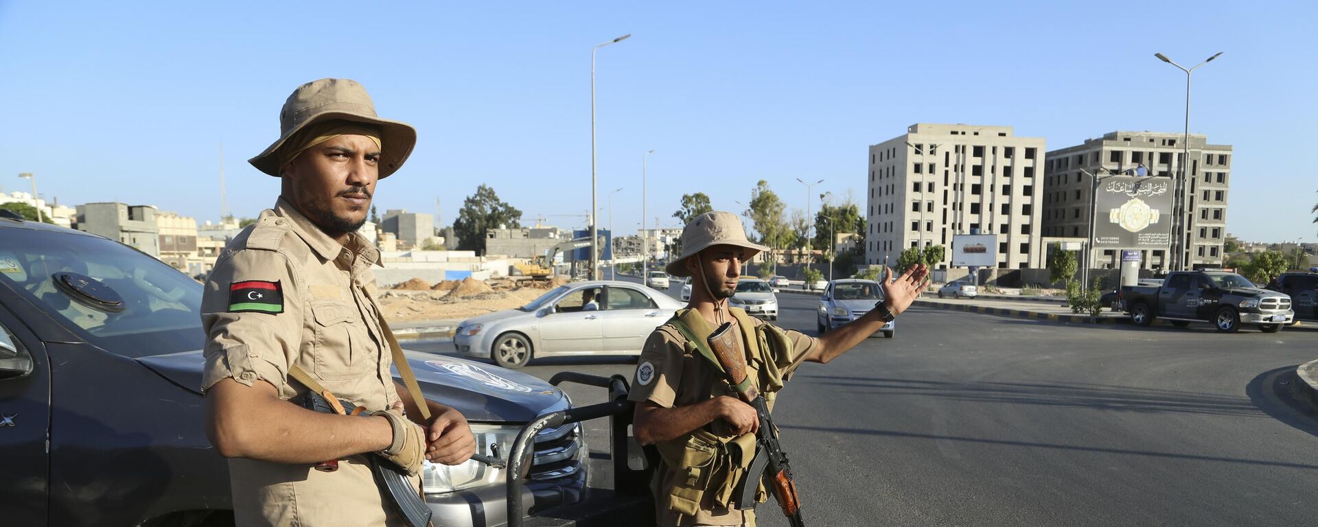 Libyan security forces stand guard in Tripoli, Libya, Tuesday, Aug. 16, 2023 - Sputnik भारत, 1920, 20.03.2026