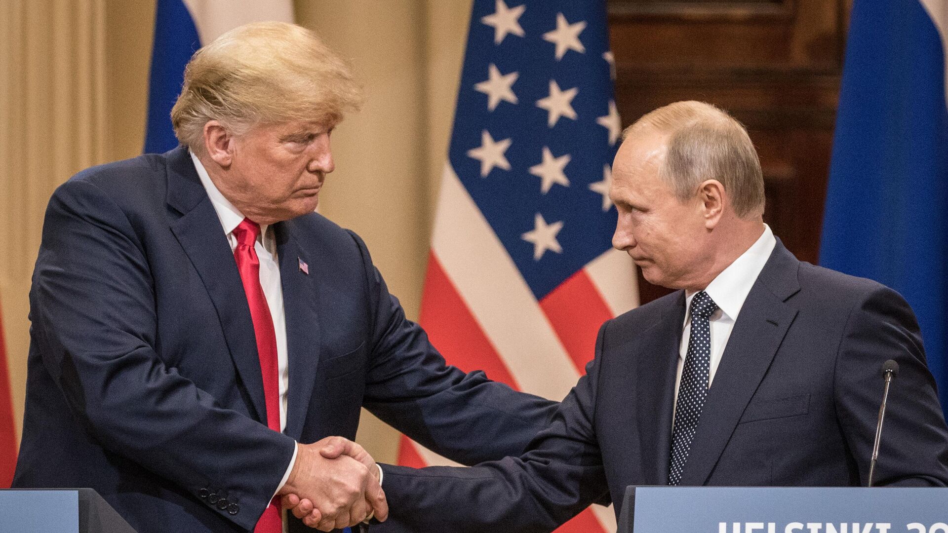 HELSINKI, FINLAND - JULY 16: U.S. President Donald Trump (L) and Russian President Vladimir Putin shake hands during a joint press conference after their summit on July 16, 2018 in Helsinki, Finland. The two leaders met one-on-one and discussed a range of issues including the 2016 U.S Election collusion. (Photo by Chris McGrath/Getty Images) HELSINKI, FINLAND - JULY 16: U.S. President Donald Trump (L) and Russian President Vladimir Putin shake hands during a joint press conference after their summit on July 16, 2018 in Helsinki, Finland. The two leaders met one-on-one and discussed a range of issues including the 2016 U.S Election collusion. (Photo by Chris McGrath/Getty Images) - Sputnik India, 1920, 20.05.2025