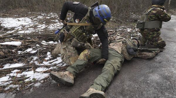 Ukrainian soldiers in Kharkiv region, Ukraine, on Thursday, Feb. 29, 2024.  - Sputnik भारत