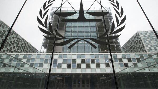 FILE- In this Nov. 7, 2019 file photo, the International Criminal Court, or ICC, is seen in The Hague, Netherlands. President Donald Trump has lobbed a broadside attack against the International Criminal Court. He's authorizing economic sanctions and travel restrictions against court workers directly involved in investigating American troops and intelligence officials for possible war crimes in Afghanistan without U.S. consent. The executive order Trump signed on Thursday marks his administration’s latest attack against international organizations, treaties and agreements that do not hew to its policies. (AP Photo/Peter Dejong, File) - Sputnik भारत