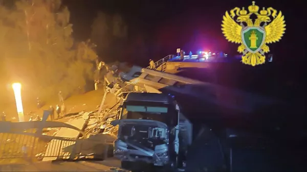 In this photo released by Moscow Interregional Transport Prosecutor's Office telegram channel on Sunday, June 1, 2025, emergency employees work at a damaged bridge in Russia's Bryansk region, which borders Ukraine. - Sputnik India