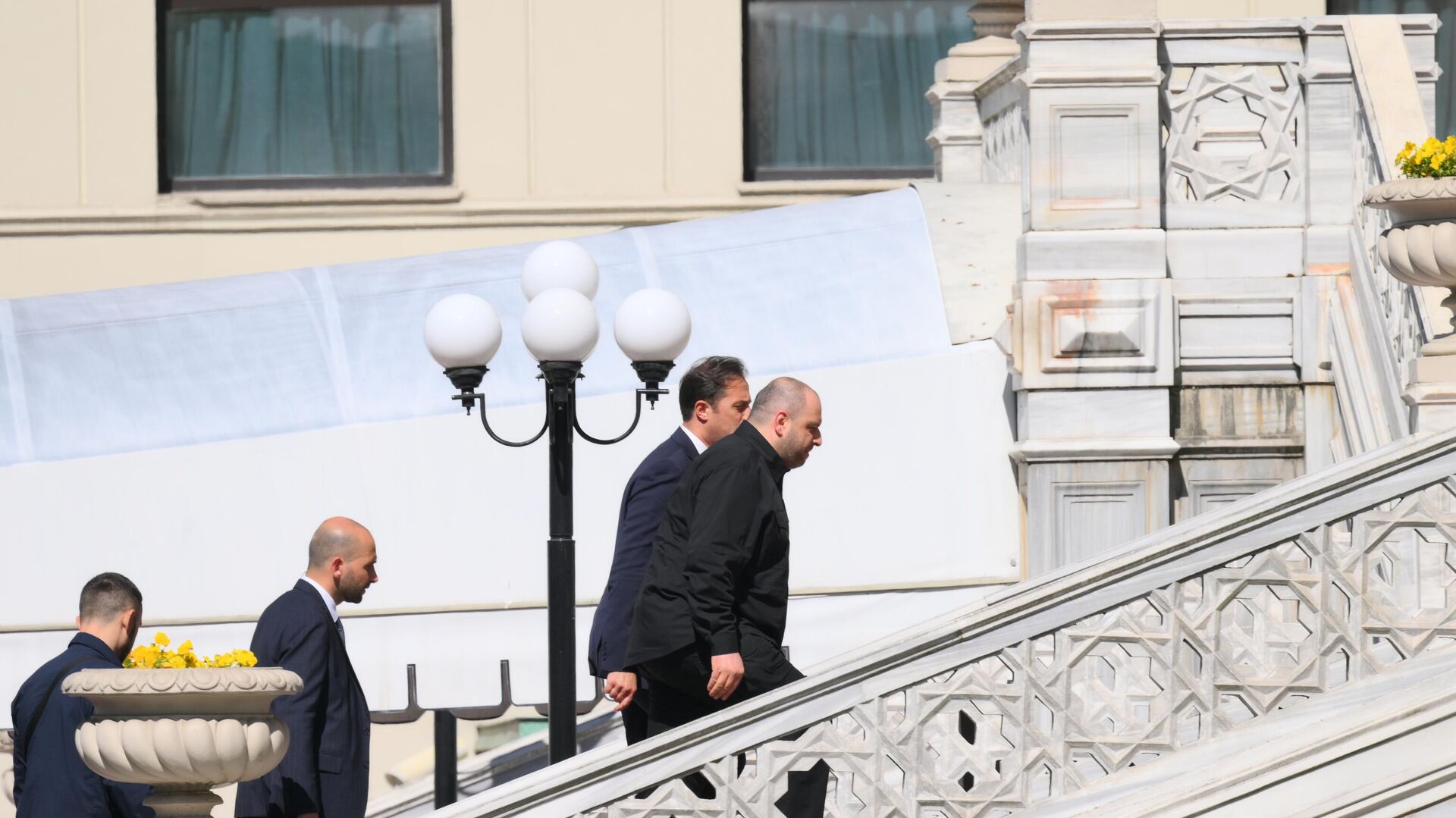 Members of the Ukrainian delegation walk up the stairs at the venue of the second round of the 2025 Istanbul peace talks in Turkiye, led by Ukrainian Defense Minister Rustem Umerov. Members of the Ukrainian delegation walk up the stairs at the venue of the second round of the 2025 Istanbul peace talks in Turkiye, led by Ukrainian Defense Minister Rustem Umerov. - Sputnik India, 1920, 03.06.2025