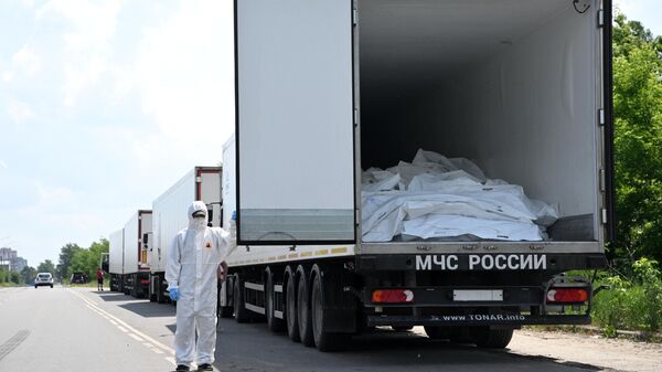 Refrigerated trucks with 1,212 bodies of dead Ukrainian servicemen in the Bryansk region. - Sputnik भारत