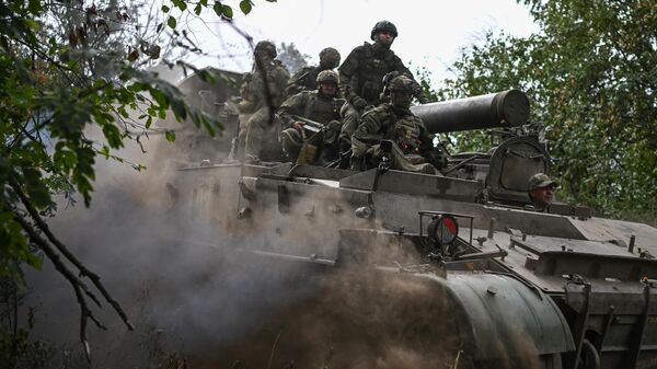 Russian servicemen of the 17th Guards Artillery Brigade of the 3rd Army Corps ride a 2S4 Tyulpan (Tulip) self-propelled heavy mortar in the course of Russia's military operation in Ukraine, in Russia - Sputnik India