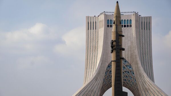 An Iran-made ballistic missile is displayed in front of the Azadi (Freedom) Monument during a rally commemorating the 46th anniversary of the victory of Iran's 1979 Islamic Revolution at Azadi Square in western Tehran, Iran, on February 10, 2025. The Iranian Islamic Revolution, which leads to the overthrow of the Pahlavi dynasty in 1979, replaces the Imperial State of Iran with the present-day Islamic Republic of Iran.  - Sputnik भारत