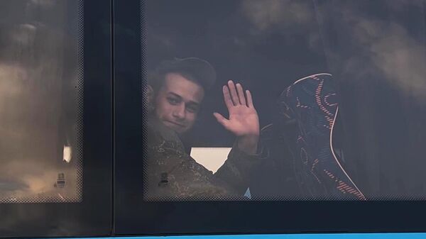 A bus with servicemen of the Russian Armed Forces who returned from Ukrainian captivity - Sputnik भारत