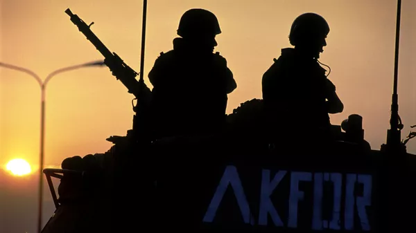 Unidentified Italian NATO soldiers patrol in a tank on June 29, 1999 in the center of Djakovica, Kosovo. Hundreds of thousands of people fled into Macedonia and Albania during the Serb terror of Kosovo. The international community entered Kosovo in June 1999 and Serb troops fled to Serbia. - Sputnik भारत