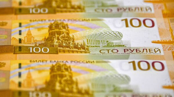 Russia's 100-ruble banknotes. File photo - Sputnik India