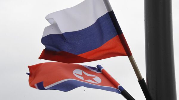 Russia and North Korea Flags - Sputnik भारत