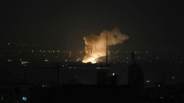 Smoke rises after an explosion in Tehran, Iran, Friday, June 13, 2025. Israel attacked Iran's capital early Friday, with explosions booming across Tehran. - Sputnik भारत