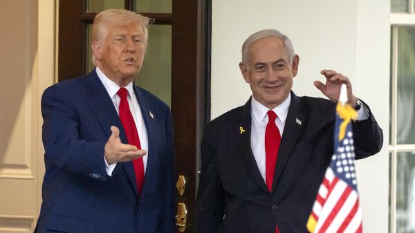 President Donald Trump, left, and Israel's Prime Minister Benjamin Netanyahu wave as Netanyahu leaves the West Wing of the White House, Monday, April 7, 2025, in Washington.  - Sputnik India