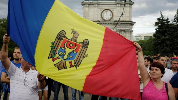 Participants in a protest in Moldova - Sputnik भारत
