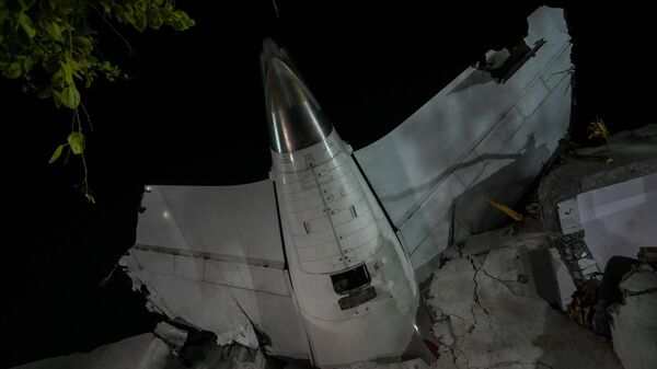 AHMEDABAD, INDIA - JUNE 12: Tail of crashed plane inside hostel building at the site of the Air India flight crash on June 12, 2025 in Ahmedabad, India. 265 people died and many others were injured after the Air India 171 flight headed to London from Ahmedabad crashed moments after take-off. The plane crashed on a resident doctors' hostel in Ahmedabad, which suffered major damage in the accident.  (Photo by Raju Shinde/Hindustan Times via Getty Images) - Sputnik India