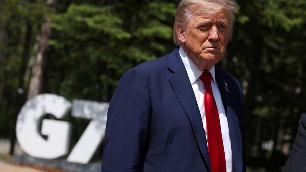 U.S. President Donald Trump and British Prime Minister Keir Starmer, not pictured, speak to the media at the G7 summit, in Kananaskis, Alberta, Monday, June 16, 2025. (Suzanne Plunkett/Pool Photo via AP) - Sputnik India