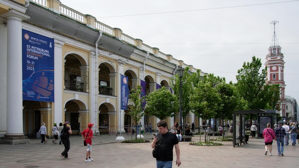 A banner featuring the symbol of the St. Petersburg International Economic Forum (SPIEF) displayed on the Gostiny Dvor building on Nevsky Prospekt in St. Petersburg.
SPIEF 2025 will be held from June 18 to 21.
Photo: Alexey Danichev / Sputnik - Sputnik India