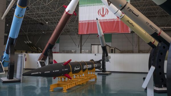 Fattah, Iran's first-ever hypersonic missile, is placed next to Iranian surface-to-surface missiles at the Islamic Revolutionary Guard Corps (IRGC) National Aerospace Park in western Tehran, October 11, 2023. The IRGC National Aerospace Park, showcasing the achievements of the IRGC Aerospace Force, was inaugurated on September 27, 2020, by IRGC Commander-in-Chief Major General Hossein Salami and IRGC Aerospace Force Brigadier General Amir Ali Hajizadeh. In February, the IRGC Aerospace Force commander announced Iran's expertise in guiding solid-propellant missiles beyond the Earth's atmosphere. (Photo by Morteza Nikoubazl/NurPhoto via Getty Images) - Sputnik India