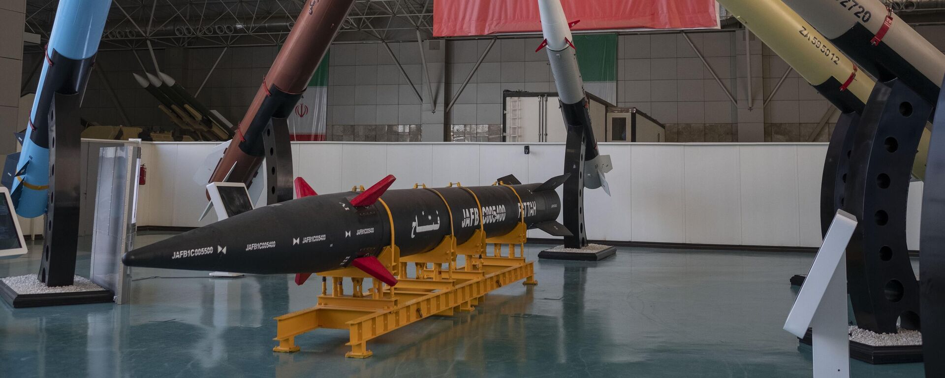 Fattah, Iran's first-ever hypersonic missile, is placed next to Iranian surface-to-surface missiles at the Islamic Revolutionary Guard Corps (IRGC) National Aerospace Park in western Tehran, October 11, 2023. The IRGC National Aerospace Park, showcasing the achievements of the IRGC Aerospace Force, was inaugurated on September 27, 2020, by IRGC Commander-in-Chief Major General Hossein Salami and IRGC Aerospace Force Brigadier General Amir Ali Hajizadeh. In February, the IRGC Aerospace Force commander announced Iran's expertise in guiding solid-propellant missiles beyond the Earth's atmosphere. (Photo by Morteza Nikoubazl/NurPhoto via Getty Images) - Sputnik India, 1920, 18.06.2025