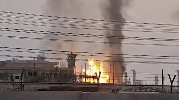 A refinery in Iran's South Pars gas field after it was struck by an Israeli drone in Kangan, in Iran's Bushehr province, Saturday, June 14, 2025.  - Sputnik भारत