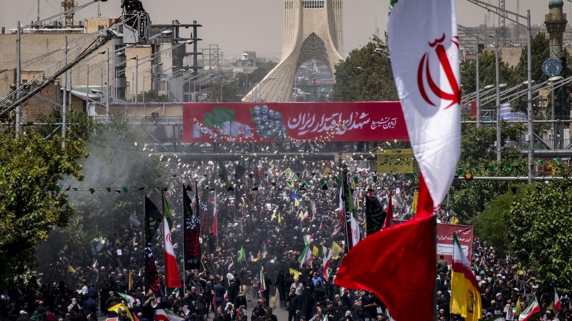 Iranian mourners participate in a funeral for the Islamic Revolutionary Guard Corps (IRGC) commanders, Iranian nuclear scientists, and civilians who are killed in Israeli attacks, in Tehran, Iran, on June 28, 2025, during the Iran-Israel ceasefire. (Photo by Morteza Nikoubazl/NurPhoto via Getty Images) Iranian mourners participate in a funeral for the Islamic Revolutionary Guard Corps (IRGC) commanders, Iranian nuclear scientists, and civilians who are killed in Israeli attacks, in Tehran, Iran, on June 28, 2025, during the Iran-Israel ceasefire. (Photo by Morteza Nikoubazl/NurPhoto via Getty Images) - Sputnik India, 1920, 30.06.2025