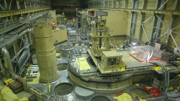 Plastic tent, right, covers the cleaning apparatus of Reactor Block 2 of the Paks Nuclear Power Plant to catch the small amount of still leaking radioactive gas in Paks, some 90 kms south of Budapest, Hungary on Tuesday, April 22, 2003 - Sputnik India