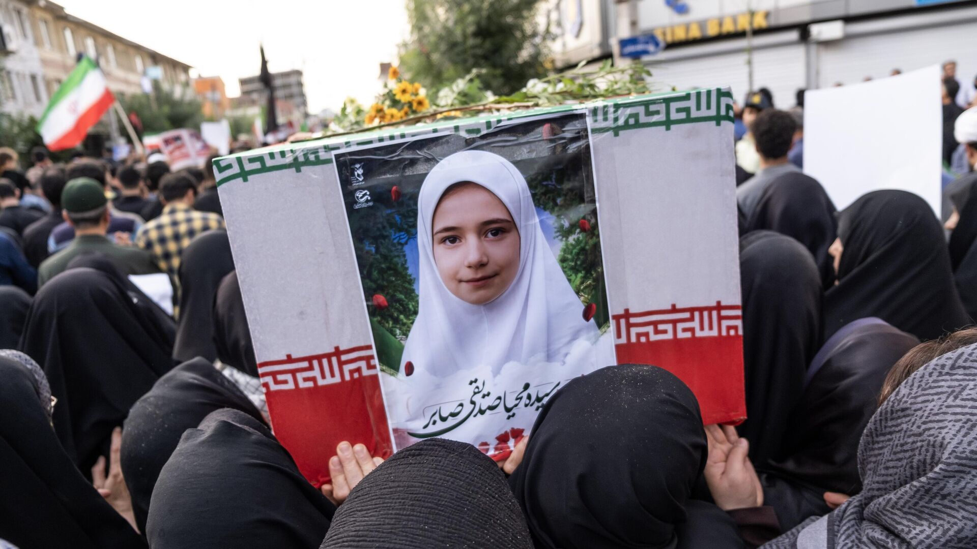 ASTANEH-YE ASHRAFIYEH, IRAN - 2025/06/26: Women are seen carrying a coffin of Mahya Sedighi Saber, the daughter of the Iranian nuclear scientist during the joint funeral for Iranian nuclear scientist Mohammad Reza Sedighi Saber and the 15 relatives and neighbors who were also killed alongside him in an Israeli rocket strike. Dozens attended the funeral of Mohammad Reza Sedighi Saber, an Iranian nuclear scientist, along with 15 of his family members and neighbors killed in an Israeli rocket strike. After surviving a failed assassination attempt in Tehran, Saber had moved to his parents' home in Astaneh Ashrafieh, Gilan Province, where the fatal second attack occurred. Israel has reportedly carried out multiple coordinated strikes across Iran targeting scientists, aiming to disrupt the country's nuclear and missile programs. (Photo by Alborz Irani/SOPA Images/LightRocket via Getty Images) ASTANEH-YE ASHRAFIYEH, IRAN - 2025/06/26: Women are seen carrying a coffin of Mahya Sedighi Saber, the daughter of the Iranian nuclear scientist during the joint funeral for Iranian nuclear scientist Mohammad Reza Sedighi Saber and the 15 relatives and neighbors who were also killed alongside him in an Israeli rocket strike. Dozens attended the funeral of Mohammad Reza Sedighi Saber, an Iranian nuclear scientist, along with 15 of his family members and neighbors killed in an Israeli rocket strike. After surviving a failed assassination attempt in Tehran, Saber had moved to his parents' home in Astaneh Ashrafieh, Gilan Province, where the fatal second attack occurred. Israel has reportedly carried out multiple coordinated strikes across Iran targeting scientists, aiming to disrupt the country's nuclear and missile programs. (Photo by Alborz Irani/SOPA Images/LightRocket via Getty Images) - Sputnik India, 1920, 01.07.2025