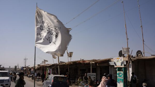 Sangin District Helmand Afghanistan December 20 2021 Taliban flag in Sangin District main market. - Sputnik भारत