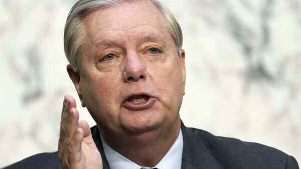 Senate Judiciary Committee Chairman Lindsey Graham, R-S.C., questions Supreme Court nominee Amy Coney Barrett during the second day of her confirmation hearing before the Senate Judiciary Committee on Capitol Hill in Washington, Tuesday, Oct. 13, 2020 - Sputnik India