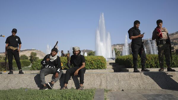 Bedouin fighters from various provinces gather at Umayyad Square in Damascus, Syria, Saturday, July 19, 2025, before heading to the southern province of Sweida to join clashes between Bedouin clans and Druze militias - Sputnik India