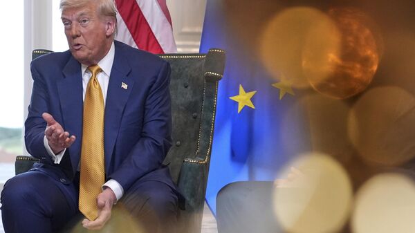 President Donald Trump speaks as he meets European Commission President Ursula von der Leyen at the Trump Turnberry golf course in Turnberry, Scotland Sunday, July 27, 2025.  - Sputnik भारत