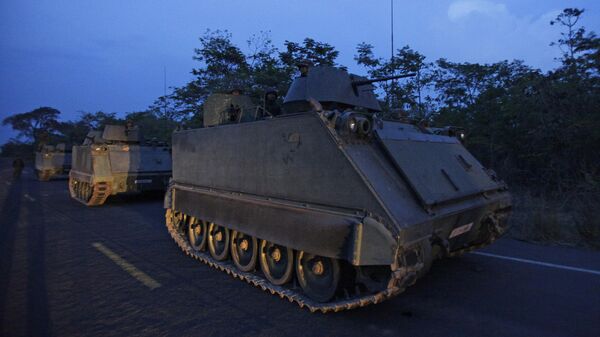 Thai soldiers on armored personnel carriers take a position at the border. File photo - Sputnik India