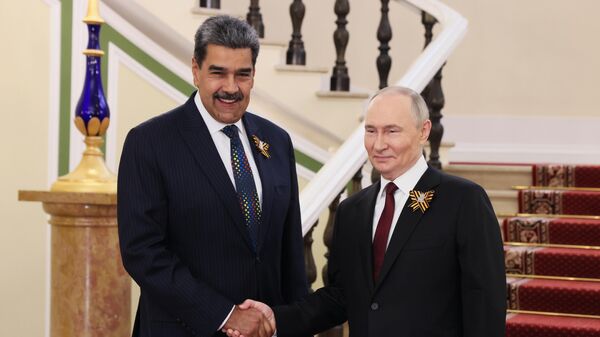 Russian President Vladimir Putin and Venezuelan President Nicolas Maduro (left) during a meeting in the Kremlin before the military parade dedicated to the 80th anniversary of Victory on May 9. - Sputnik India