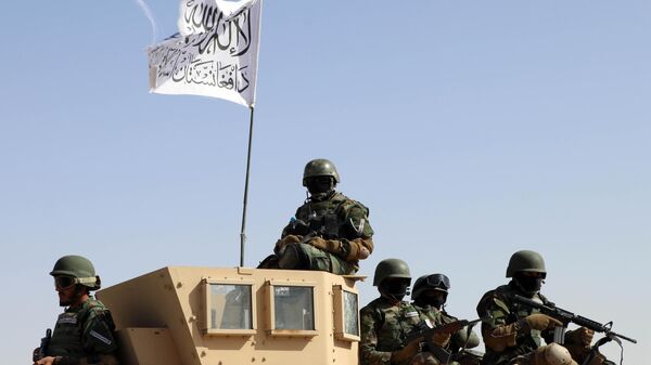 Members of Taliban led government, as well as many Afghan people participate in celebrations marking the 3rd anniversary of the Taliban rule in Kandahar, Afghanistan on August 14, 2024. - Sputnik भारत