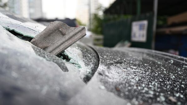A view shows a damaged car following a reported drone attack in Krasnogorsk outside Moscow, Russia. - Sputnik India