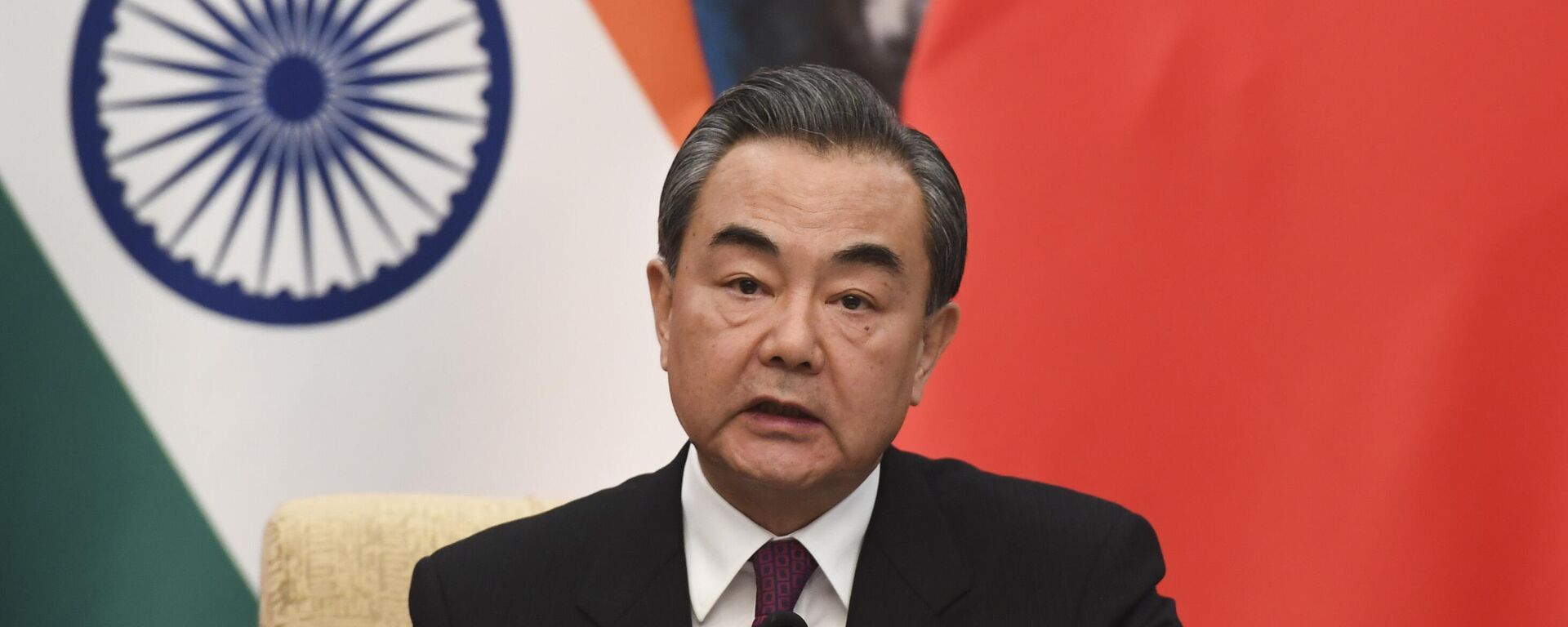 Chinese Forein Minister Wang Yi speaks during a press conference with Indian Foreign Minister Sushma Swaraj (not pictured) at the Diaoyutai State Guest House in Beijing, China, April 22, 2018. - Sputnik भारत, 1920, 19.08.2025