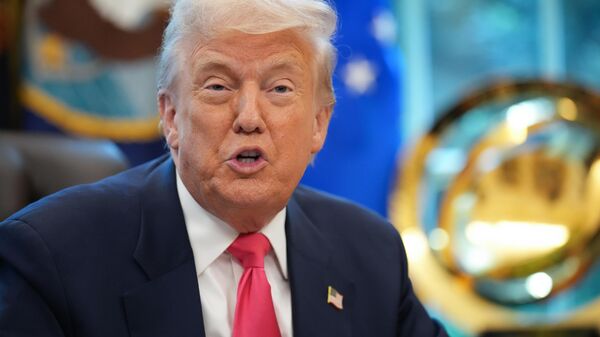 U.S. President Donald Trump speaks in the Oval Office on August 14, 2025 in Washington, DC. Trump is expected to issue a proclamation on the 90th anniversary of Social Security and highlight his administration's efforts on the program.  - Sputnik भारत