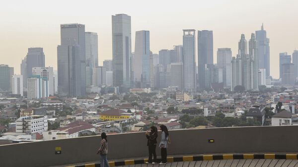 The general view of a skyscraper in Jakarta Capital city of Indonesia on June 10, 2023. The Indonesian government is in the process of moving the capital city to the island of Borneo due to the polluted, congested,  sinking  and prone to earthquakes of Jakarta. (Photo by Agoes Rudianto/NurPhoto via Getty Images) - Sputnik India