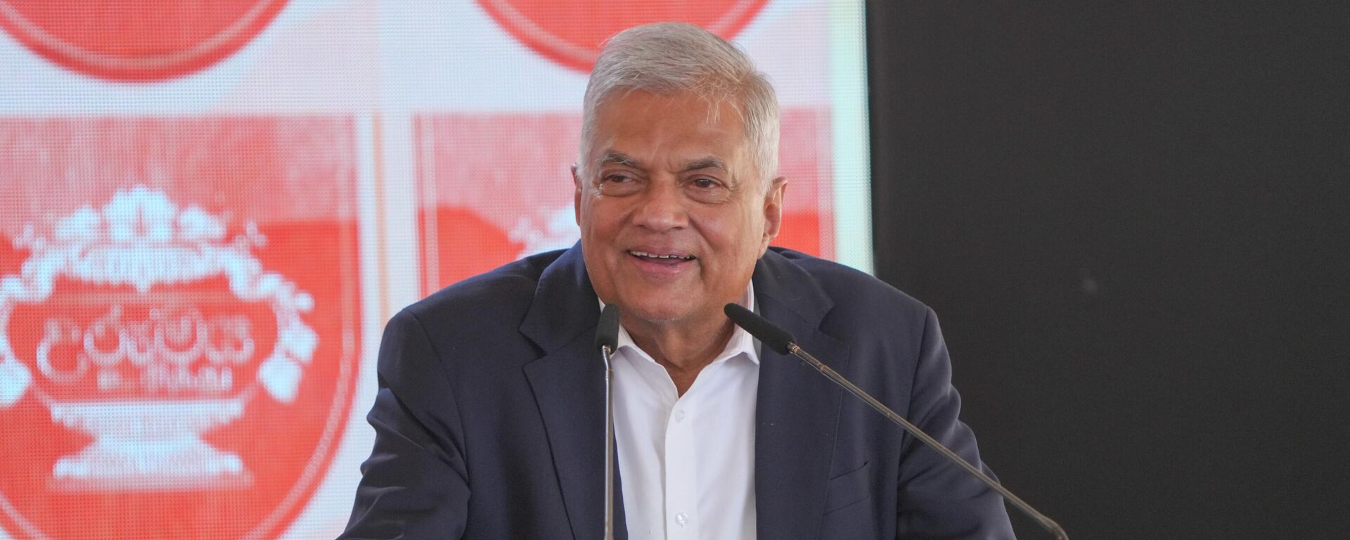 Sri Lankan President Ranil Wickremesinghe is speaking at a public event in Mahiyanganaya, Sri Lanka, on July 14, 2024. (Photo by Thilina Kaluthotage/NurPhoto via Getty Images) - Sputnik India, 1920, 22.08.2025