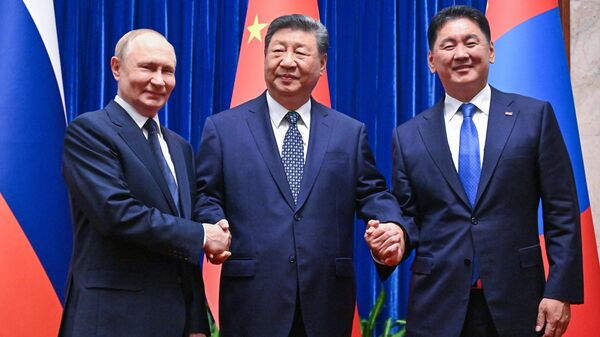 September 2, 2025 — Russian President Vladimir Putin, Chinese President Xi Jinping, and Mongolian President Ukhnaagiin Khürelsükh (left to right) during a joint photo session in Beijing.
 - Sputnik भारत