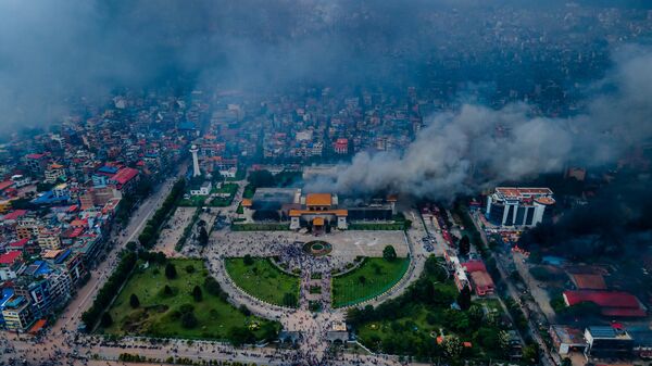 The aerial view shows demonstrators setting fires at public buildings in many places, including the Parliament building, across the Kathmandu, Lalitpur, and Bhaktapur districts in Nepal, on September 09, 2025.  - Sputnik भारत