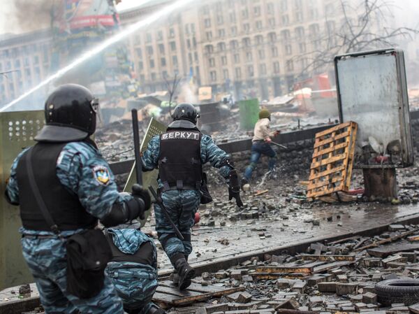 Law enforcement officers during clashes with protesters on Independence Square in Kyiv. - Sputnik India