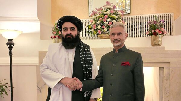 Indian MEA S Jaishankar with Afghanistan Foreign Minister Amir Khan Muttaqi - Sputnik India