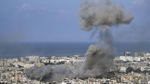 Smoke rises after an Israeli airstrike on Dahiyeh, in the southern suburb of Beirut, Lebanon, Saturday, Nov. 16, 2024. - Sputnik India