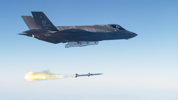 Screenshot of an image showing An F-35 Lightning II launching an AIM-120 advanced medium range air-to-air missile (AMRAAM).  - Sputnik India