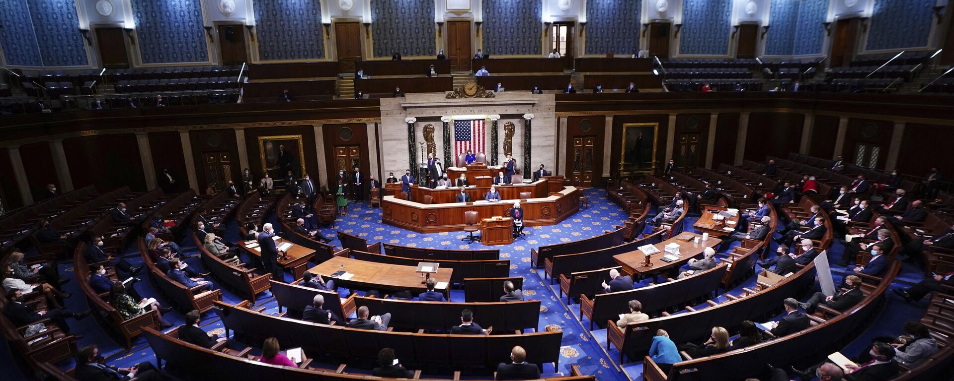 In this Jan. 6, 2021, file photo speaker of the House Nancy Pelosi speaks in the House Chamber after they reconvened for arguments over the objection of certifying Arizona's Electoral College votes in November's election, at the Capitol in Washington - Sputnik भारत, 1920, 18.12.2025