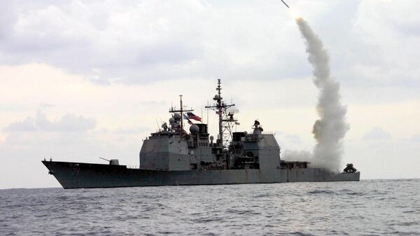 A Tomahawk Land Attack Missile (TLAM) launches from the guided missile cruiser USS Cape St. George (CG 71), in operation in the Mediterranean Sea, on March 23, 2003 - Sputnik India